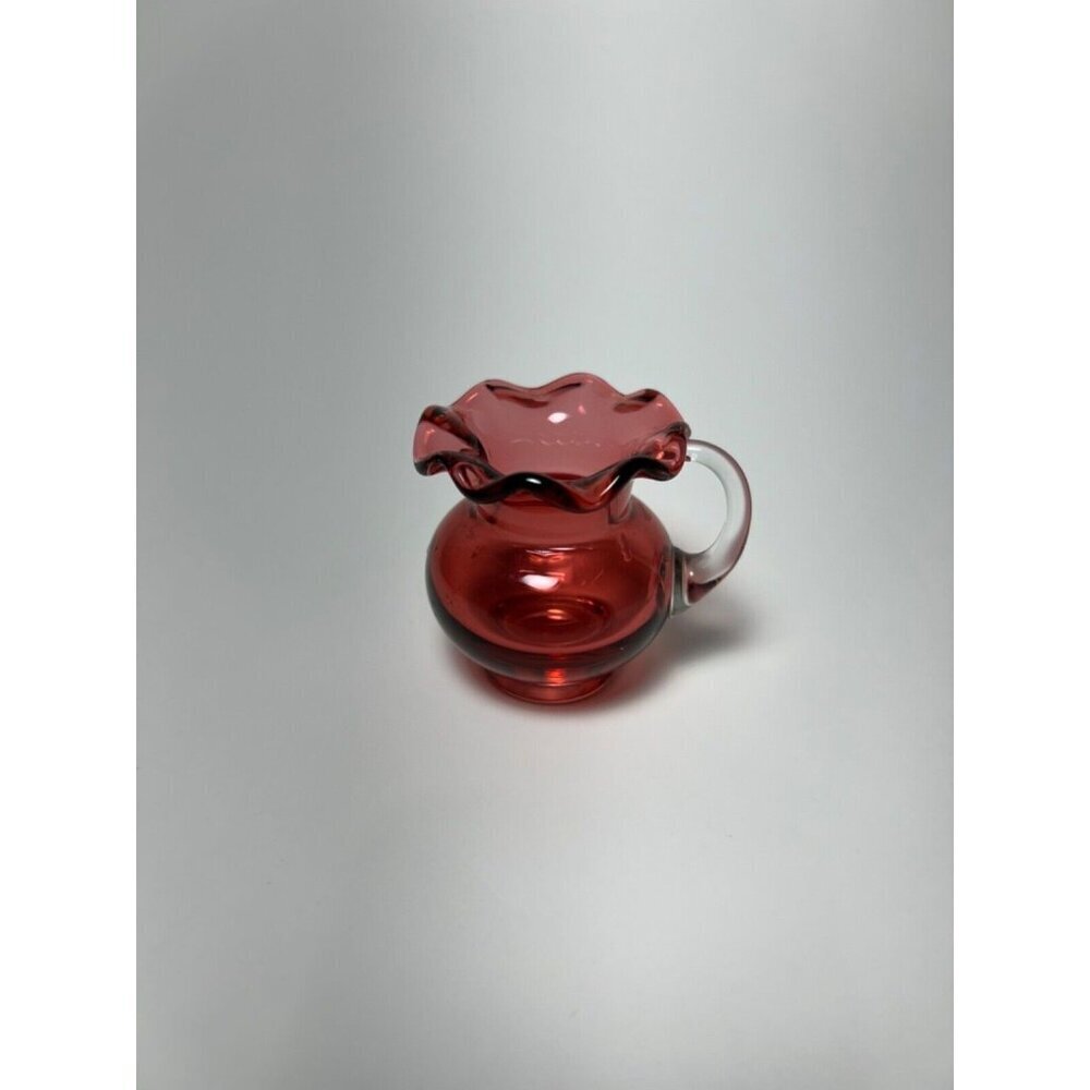 Cranberry red hand blown miniture pitchor with applied handle and ruffled collar